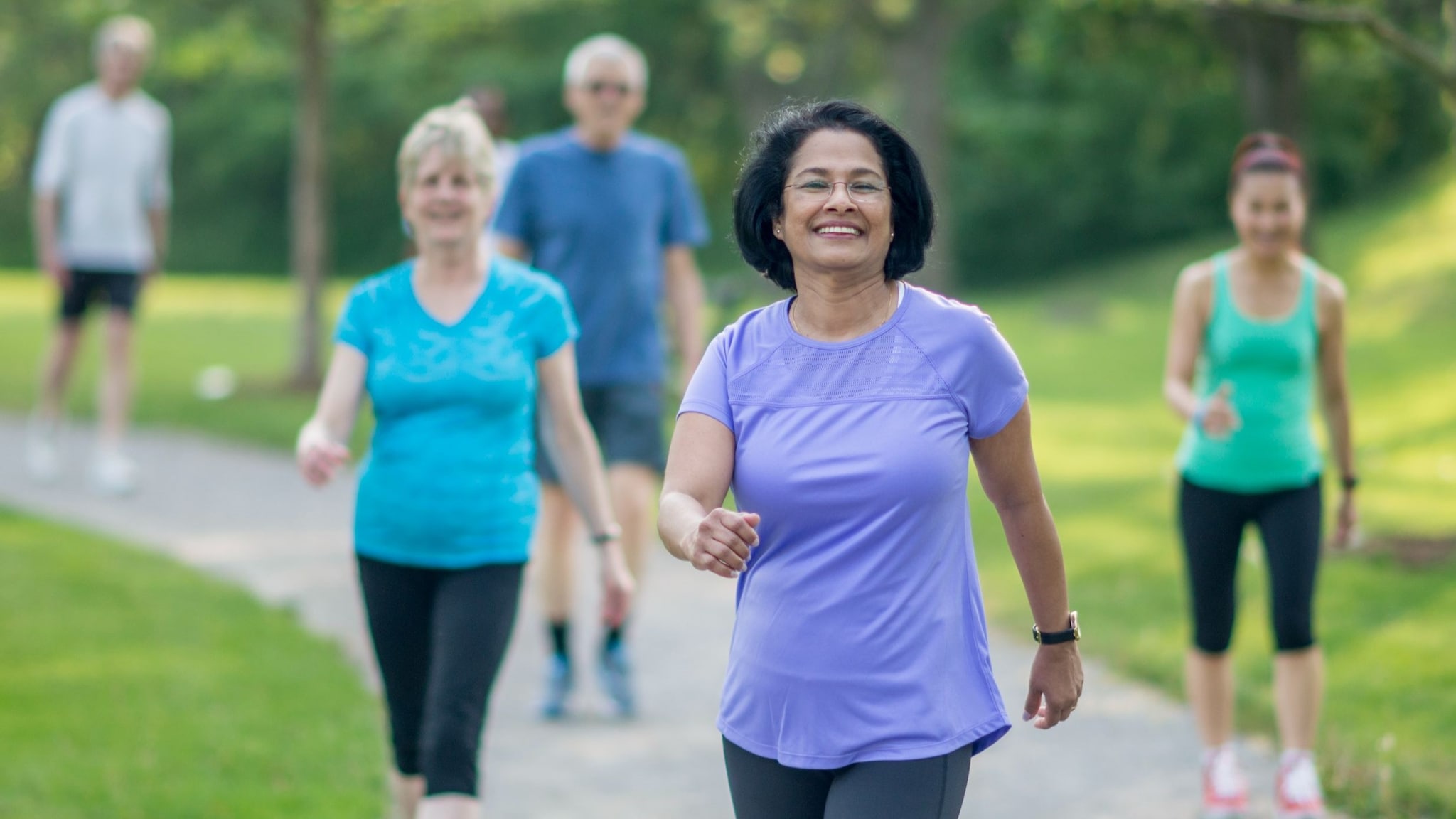 Group of people walking at the park