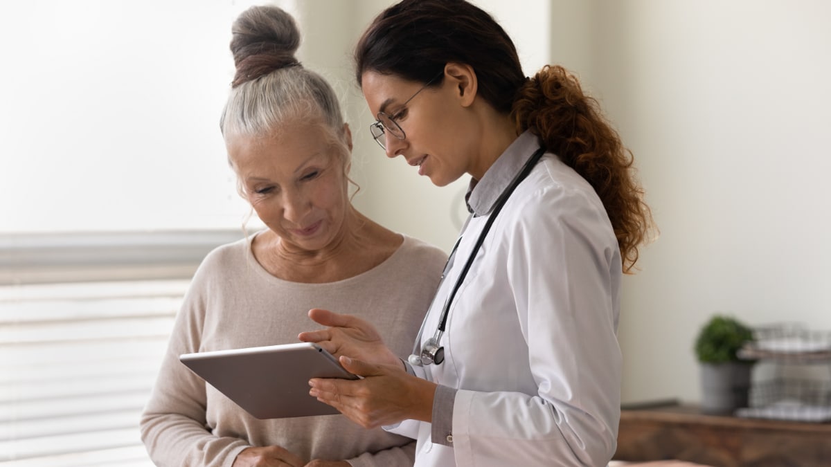 Healthcare provider talking with a patient