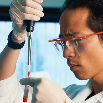 lab worker holding a test tube