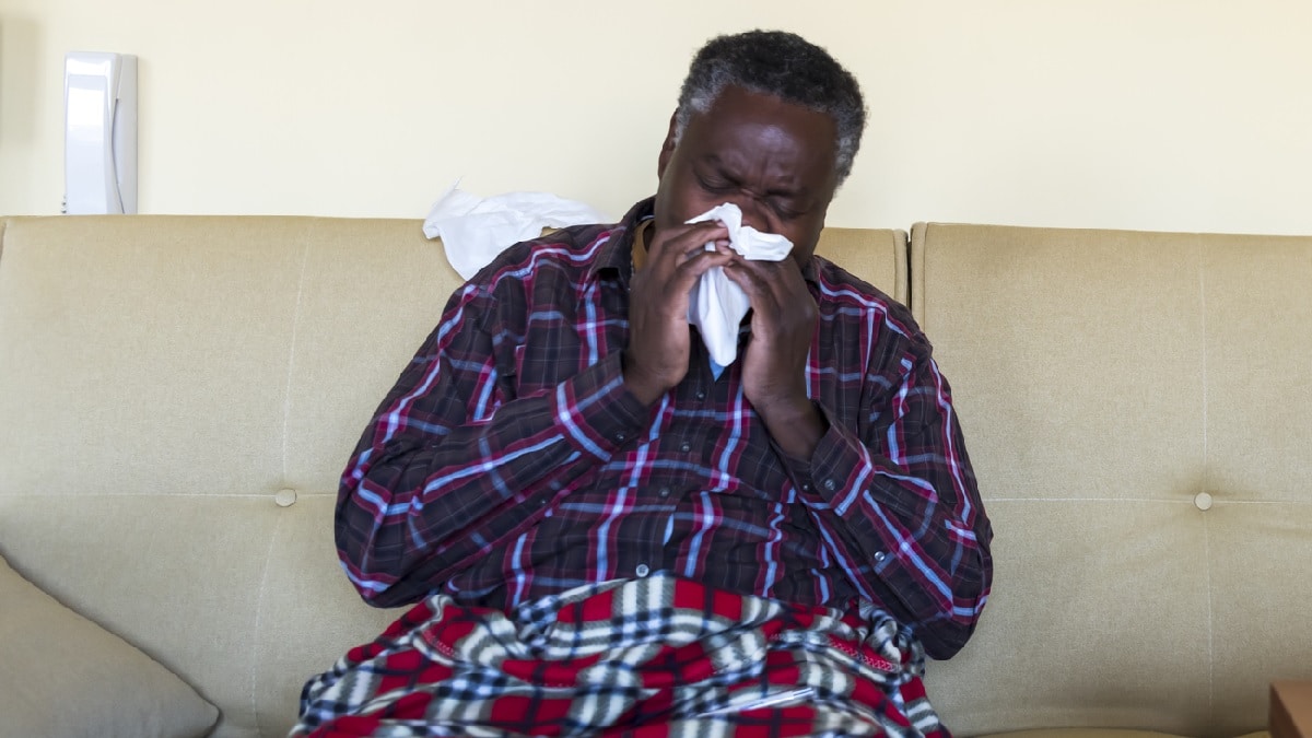 A man blowing his nose