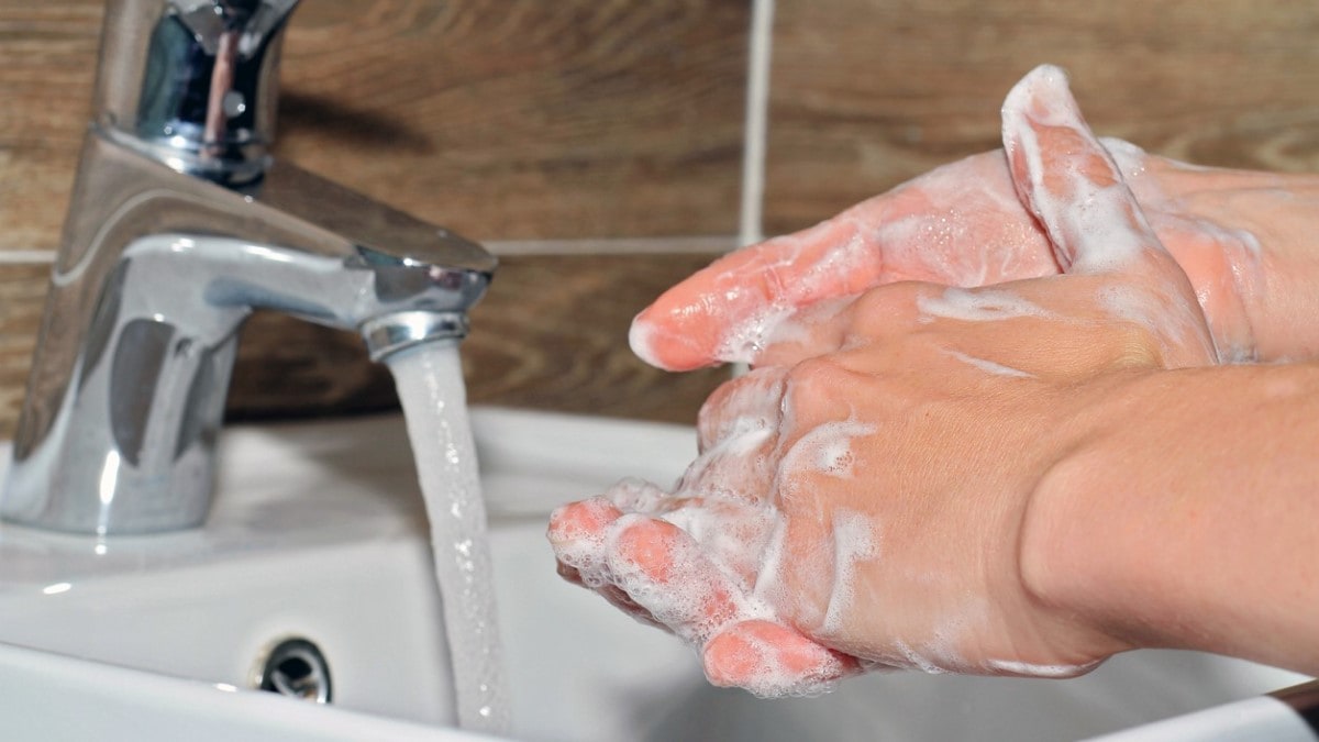 a person washing his hands