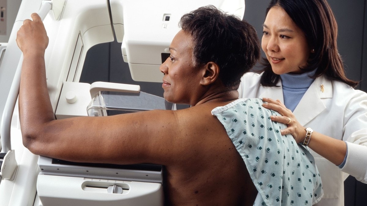 a woman getting a mammogram