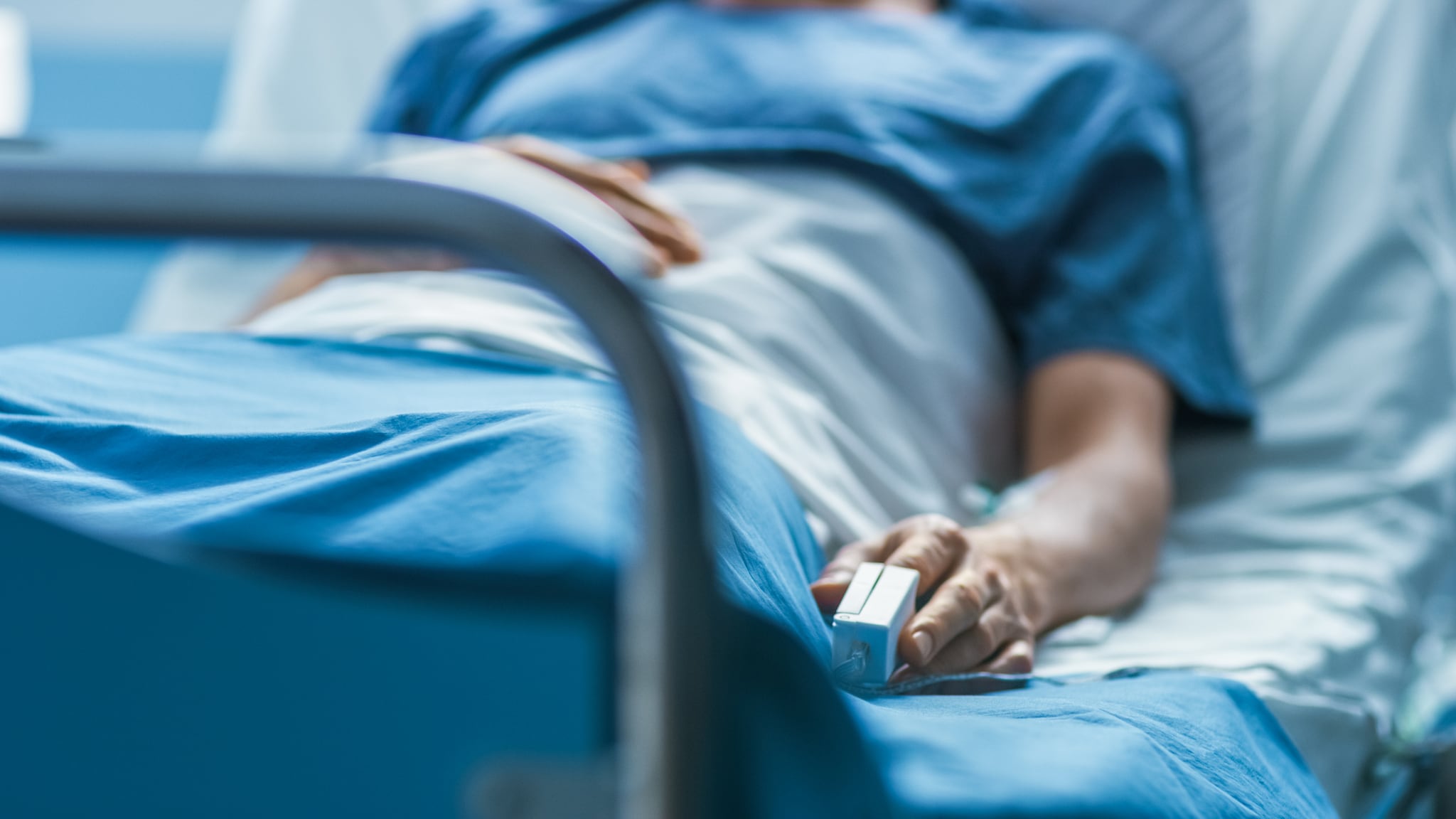 A patient in a hospital bed.