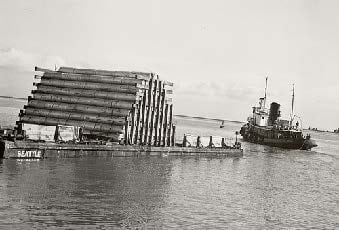 An image of a barge of bulk chemical agent containers to be disposed of at sea.