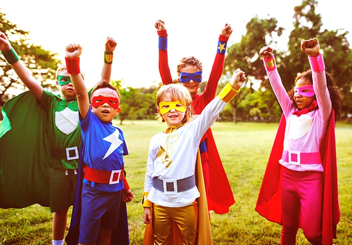 Kids dressed as superheroes