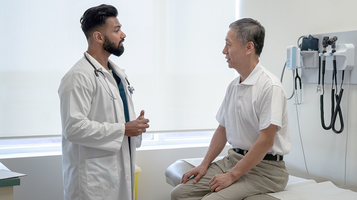 A doctor talking to a patient.