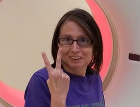 Woman making a peace sign