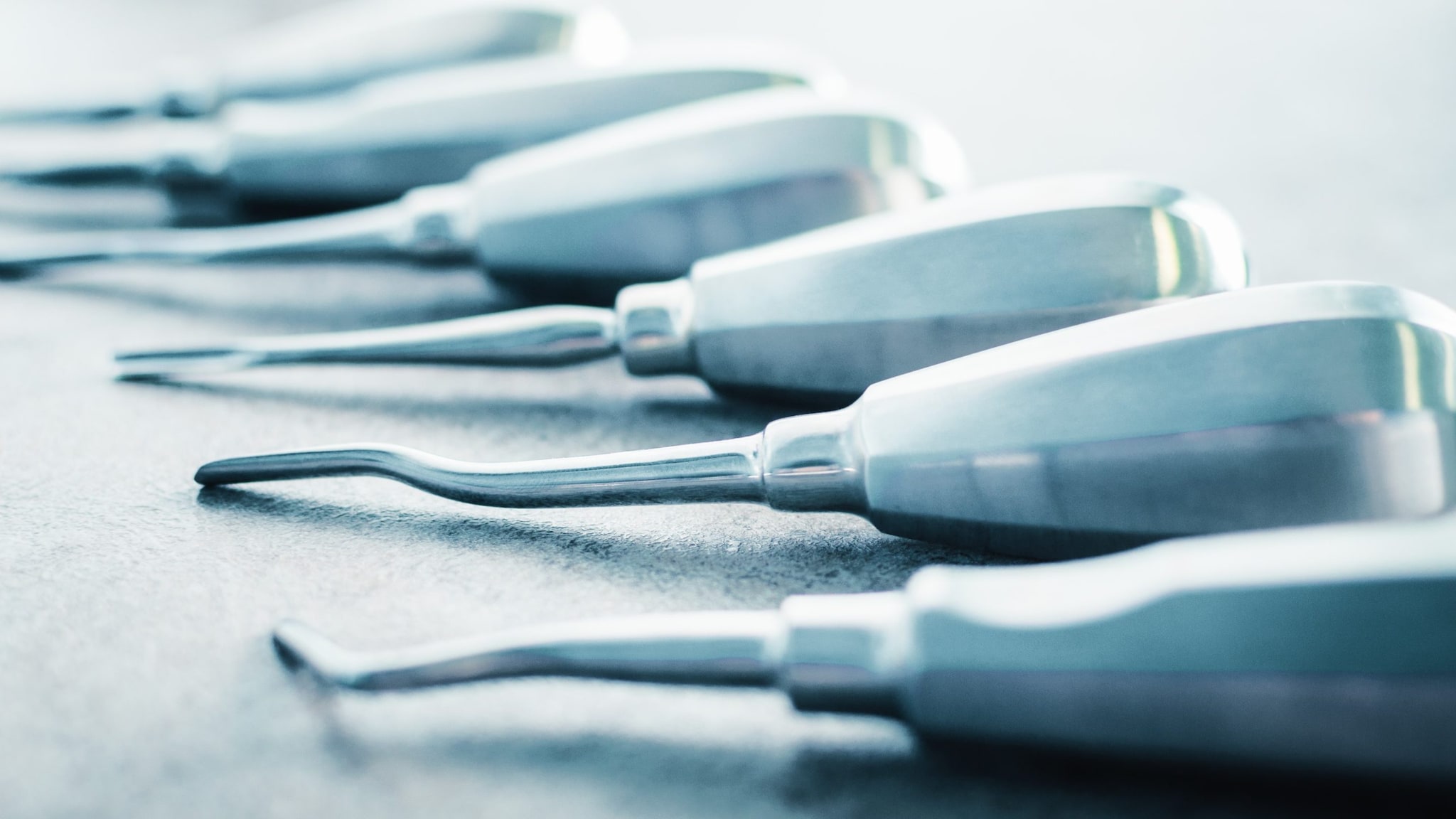 Six silver elevators used for extractions of teeth.