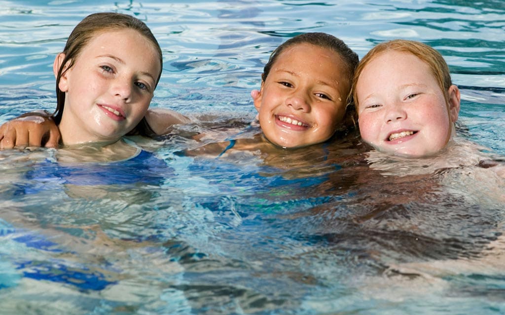 Kids playing at the Community Swim Club.