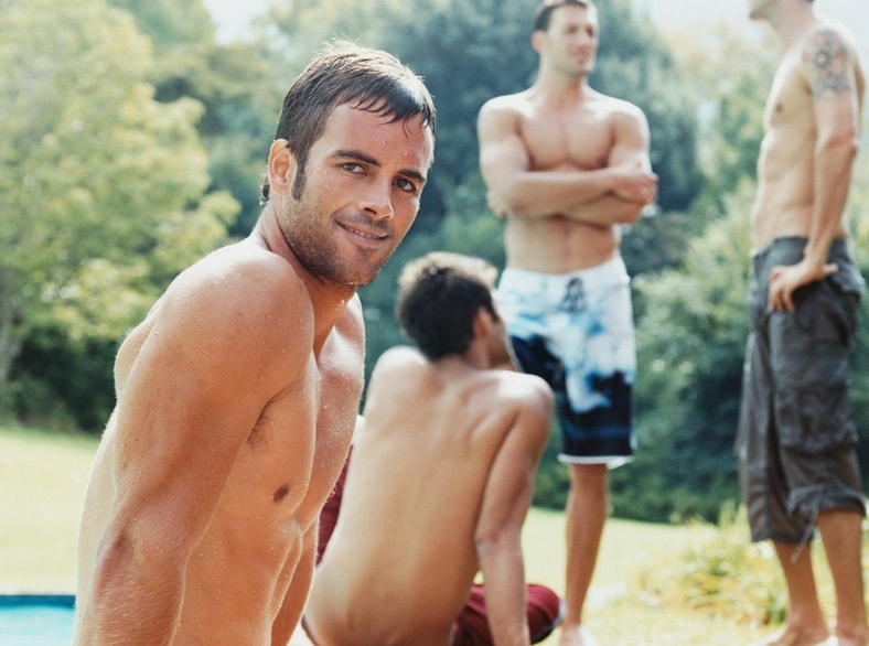 The brothers hung out by the pool while on vacation.