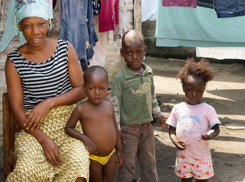 An African family with a mother and 3 children.