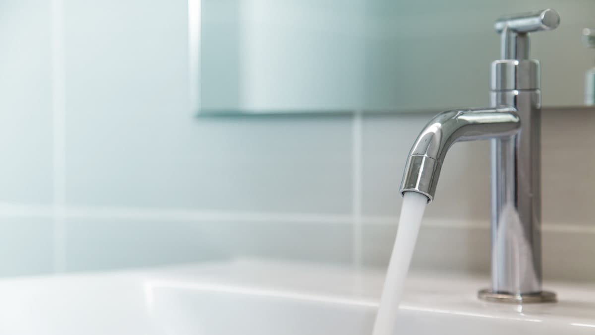 Water running from a bathroom faucet