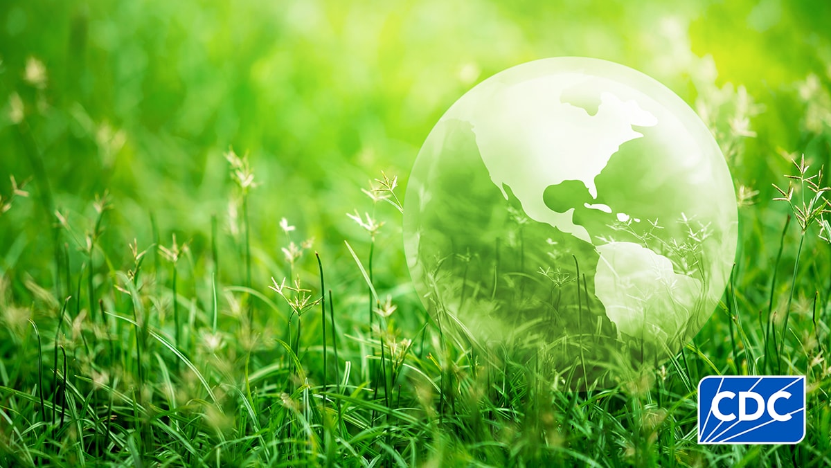 Globe surrounded by green landscape with CDC logo in lower right 