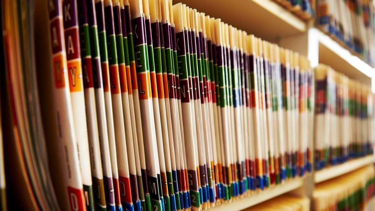 Shelves contain numerous scientific journals.