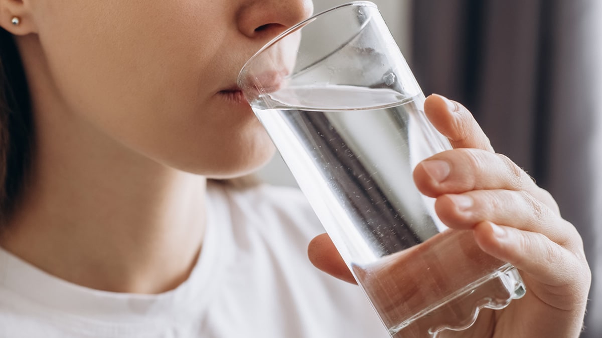 Woman drinking glass of water