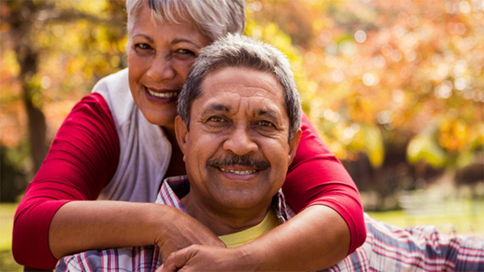 Older man and woman outside