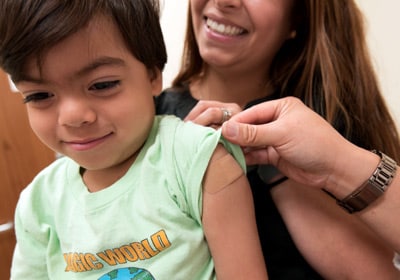 Child receiving flu vaccine