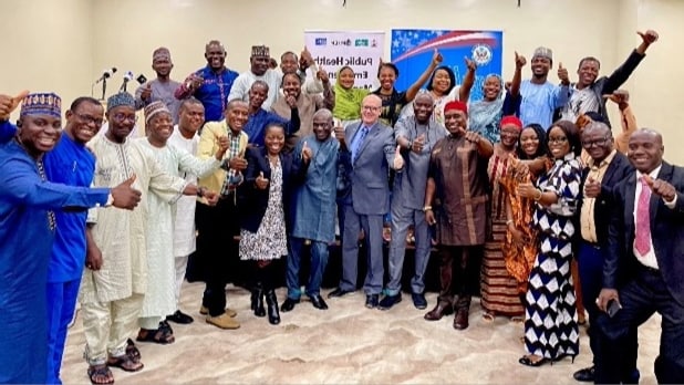 Dr. Saleh celebrates with the U.S. Consul General, CDC Nigeria Country Director, and graduates of the second cohort of the PHEM Intermediate Certification Training Program