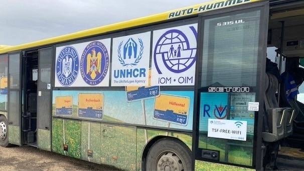 A bus transporting displaced Ukrainians from the Moldova-Ukraine border to Romania