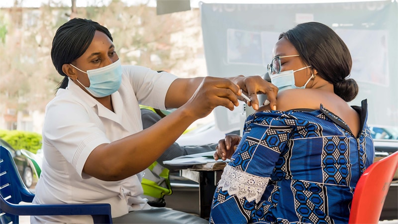 A patient receives a COVID-19 vaccine in February 2022