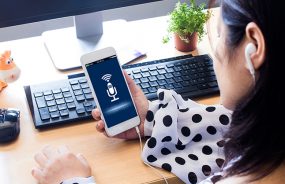 woman listening to podcast