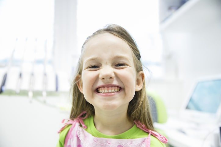 girl with tooth pain