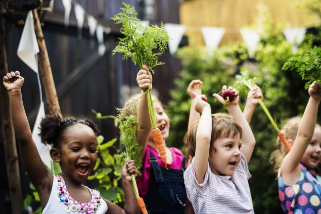 Girl learning about plants in an afterschool program