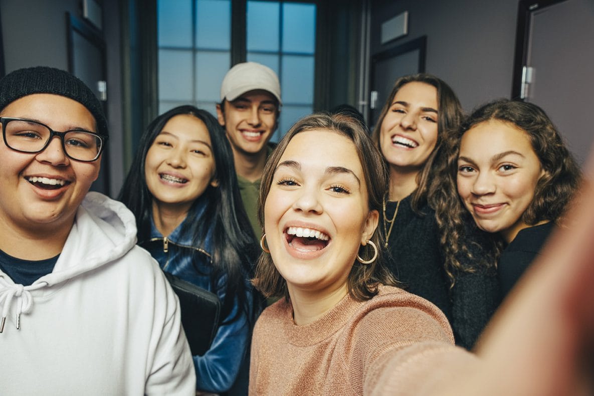 Teens taking selfie