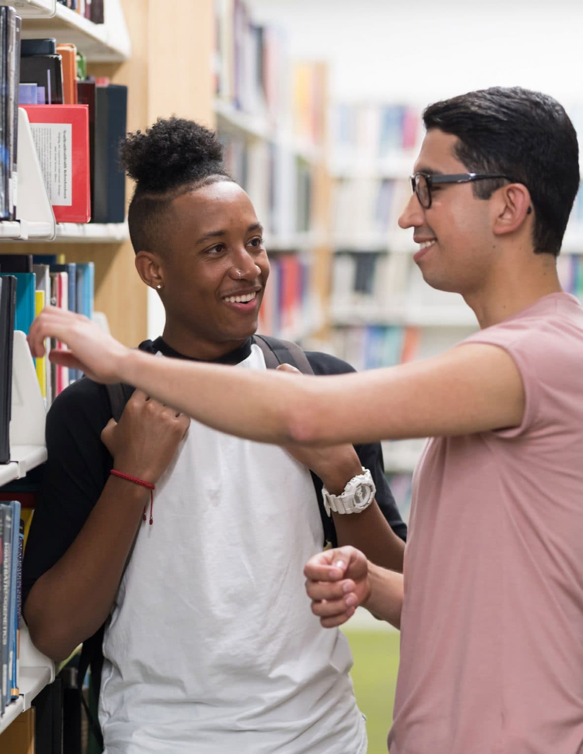 LGBTQ students hold their hands together