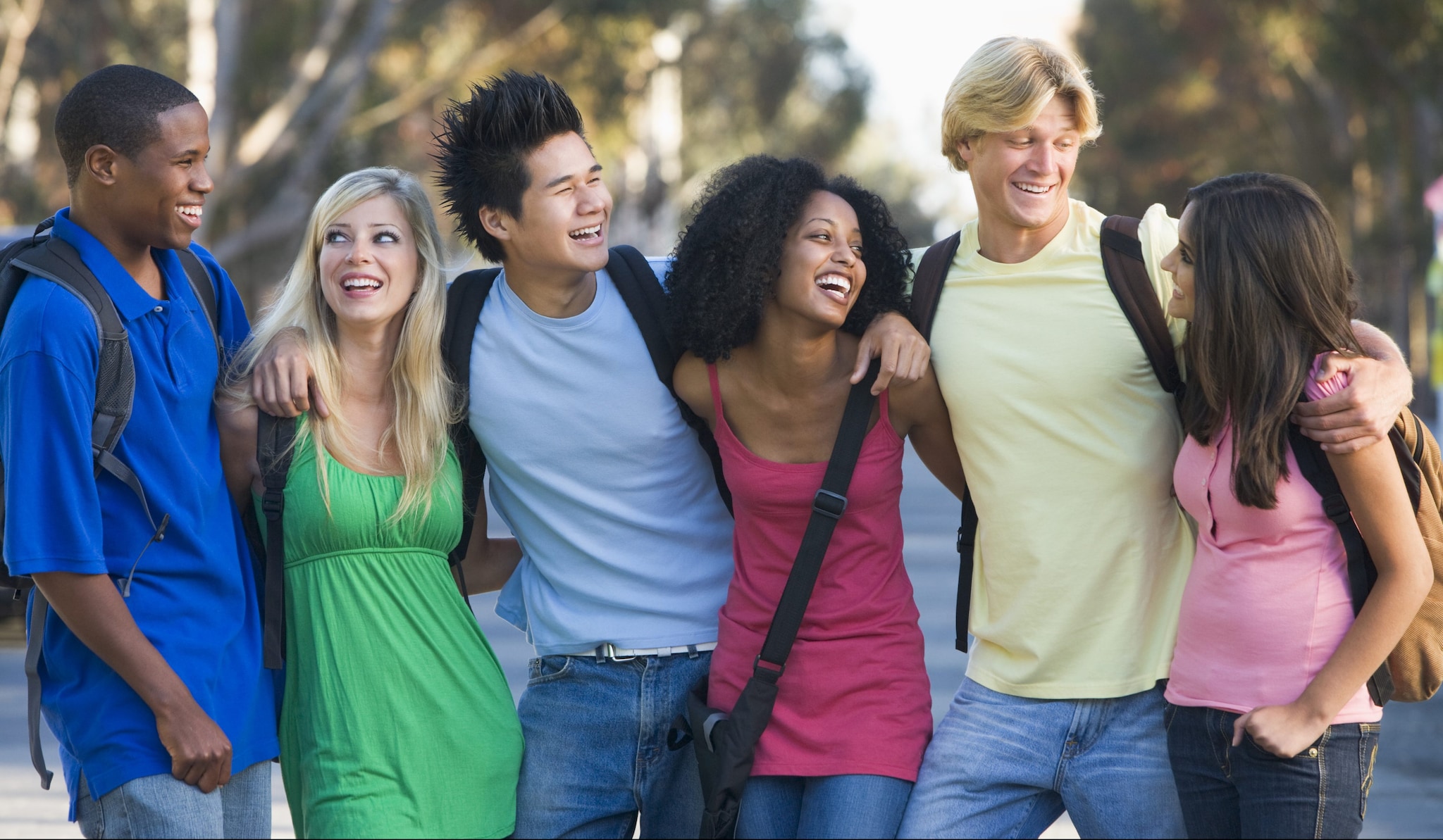 Group of young friends chatting outside