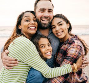 A Hispanic family at the beach