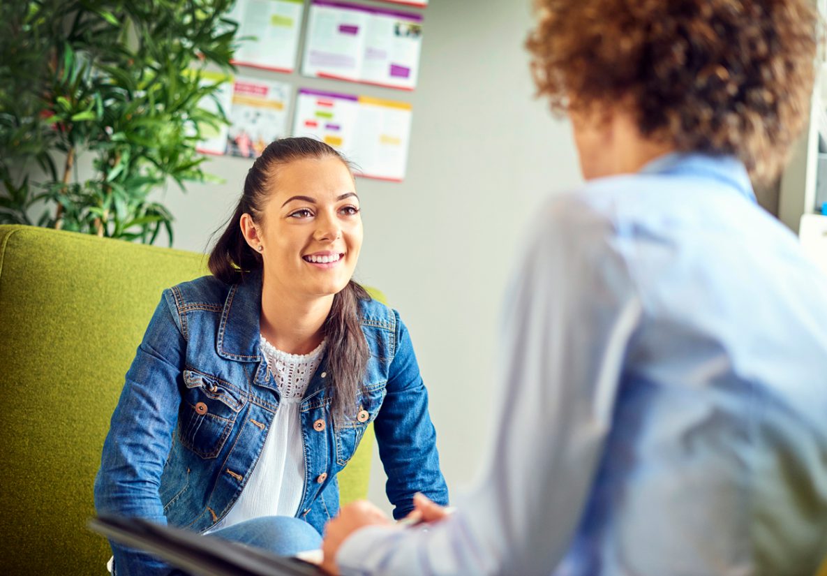 Teenage student meeting with a guidance counsellor