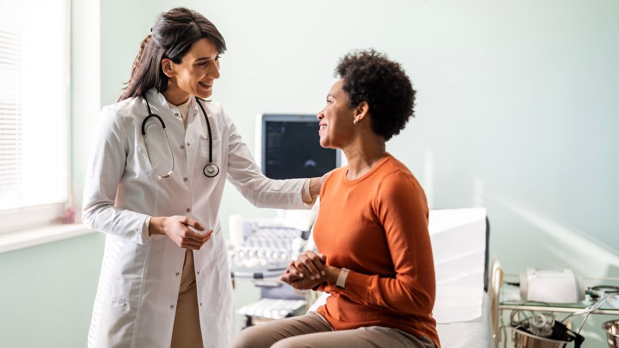 Healthcare provider talking to patient