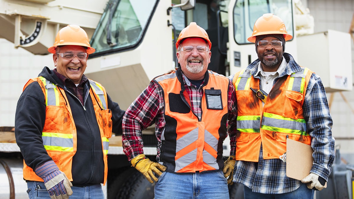 Construction workers smiling