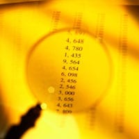 image of a magnifying glass and some numbers