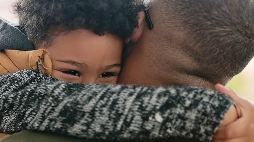 Child being reunited with their parent.