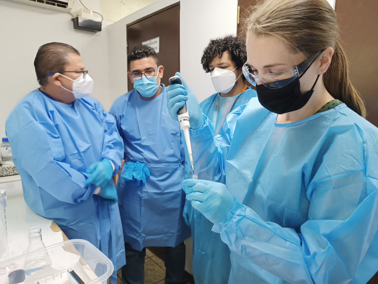 Megan Mickum working with samples in lab.