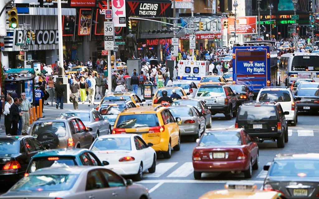 A city with streets congested with traffic.