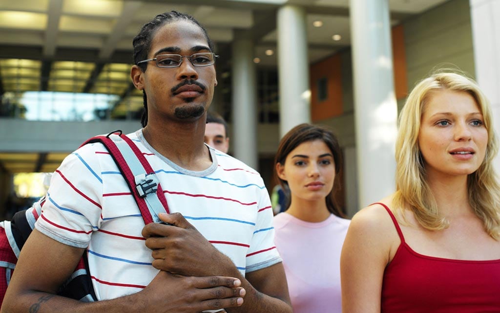 Four young adults.