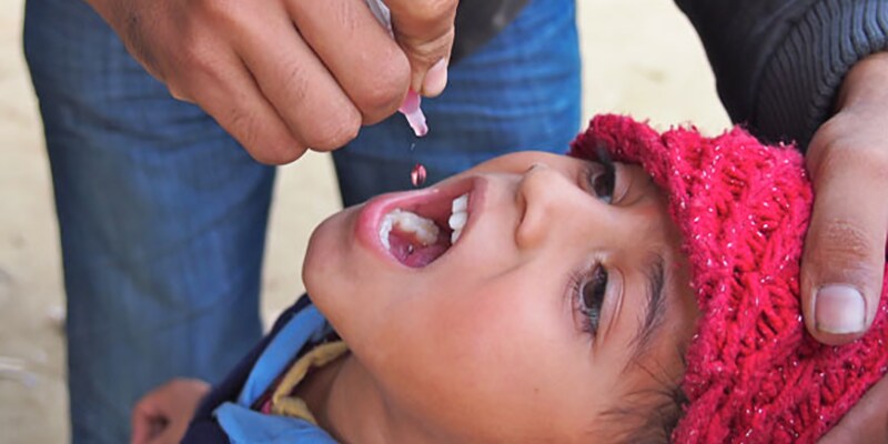 Child receiving polio vaccine