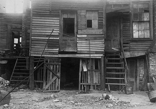 Atlanta History Center - An example of sub-standard African American housing in Atlanta, GA, 1920 - The 13th Annual Conference for the Study of Negro Problems, held at Atlanta University in 1908, includes an indictment of alley housing characterized by over-crowding, and poor construction and sanitation.