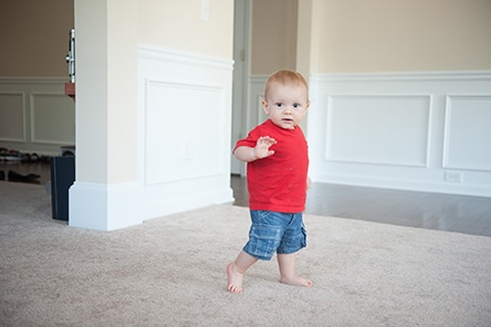 15 month old boy walking