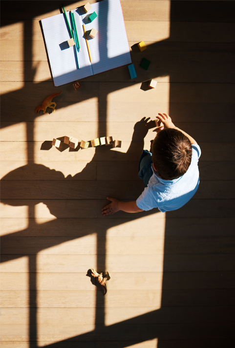 Kid playing overhead view