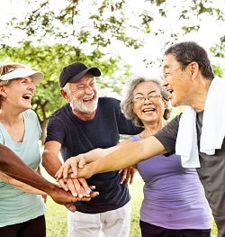 Active older couples laughing