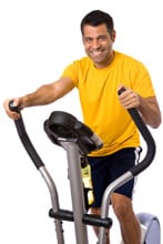 Man on elliptical machine