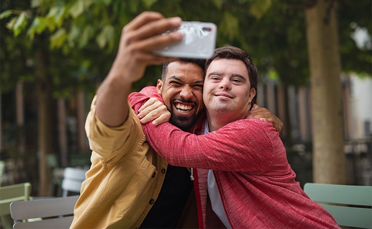 Young man with Down syndrome and his mentor