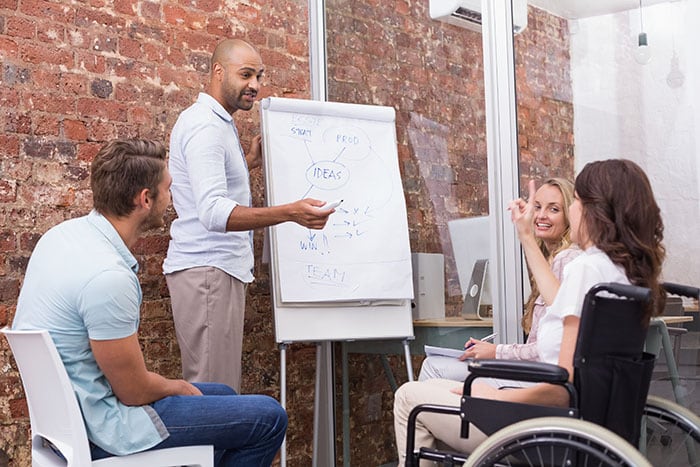 Businessman making a presentation to his fellow coworkers