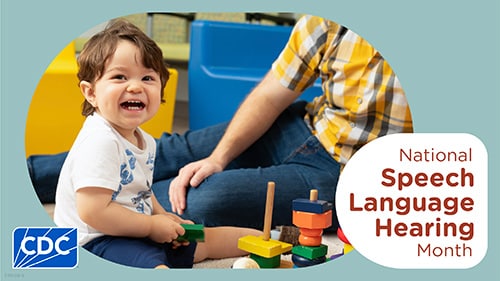 Young child plays with toys on the floor while parent looks on. Text reads, “National Speech Language Hearing Month."