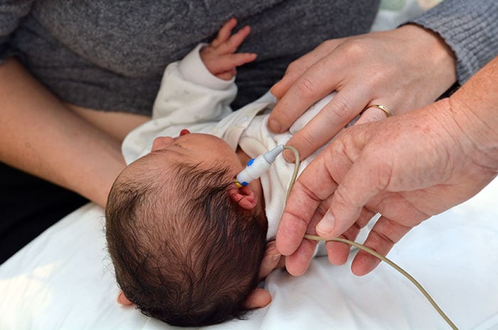 newborn hearing screening in progress