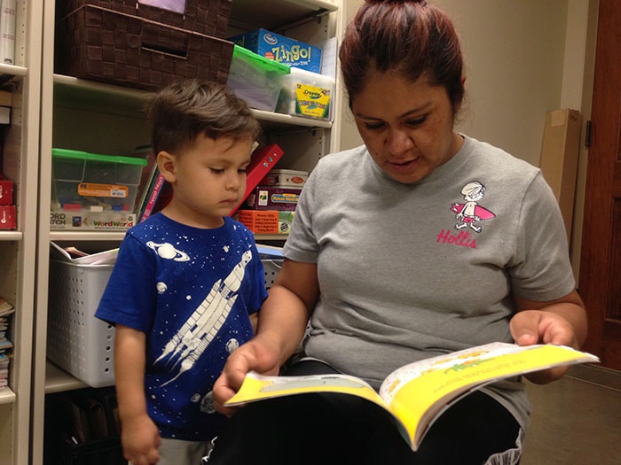 A mother reading to her child